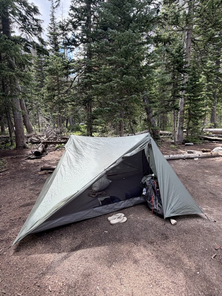 Photo of a Small Tent in the Woods